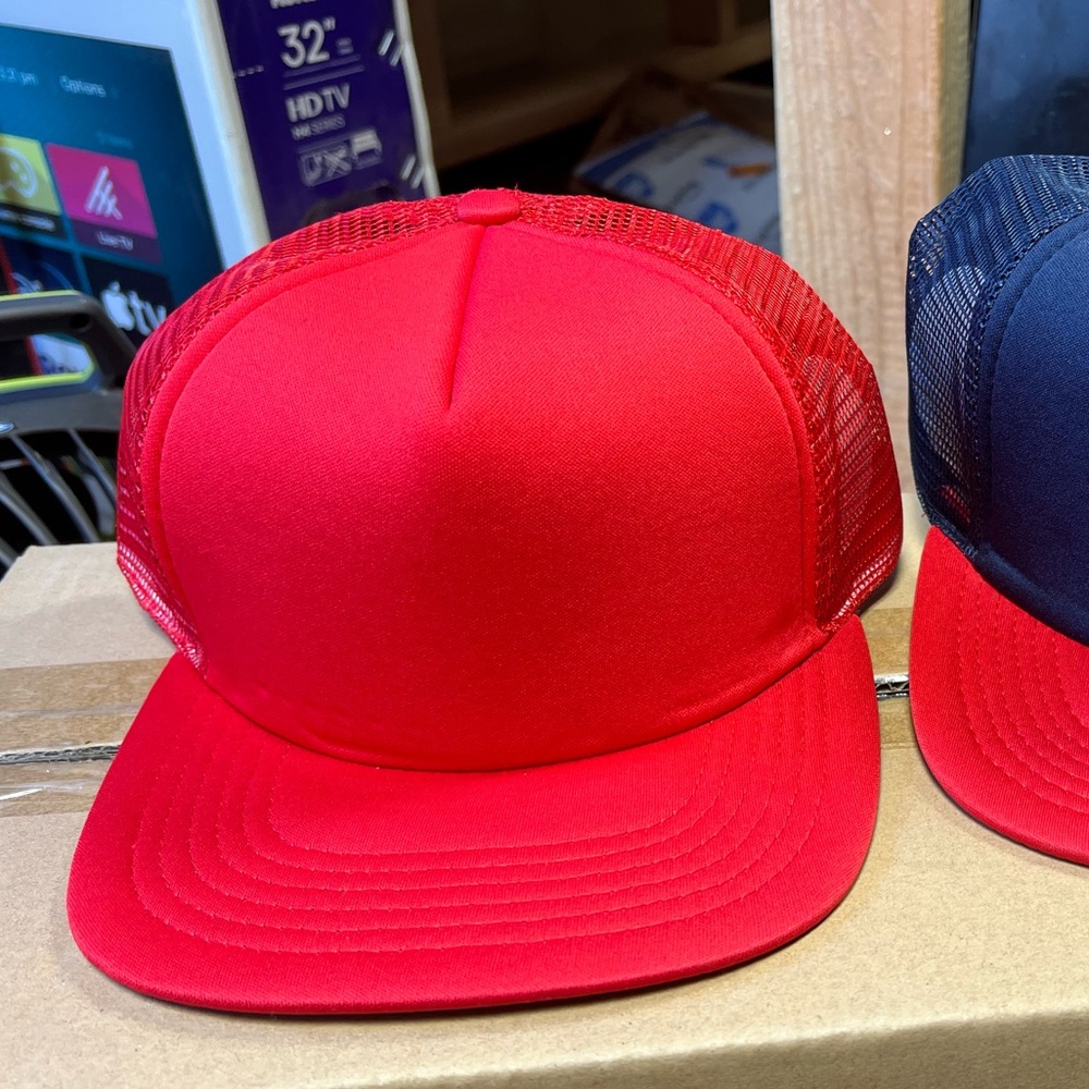 TravisMathew plain trucker hat no logo red